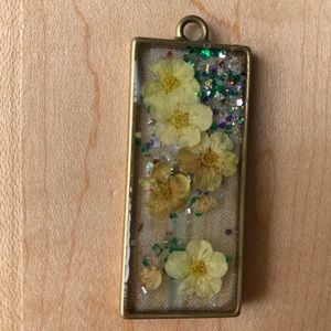 Whimsical flower pendant